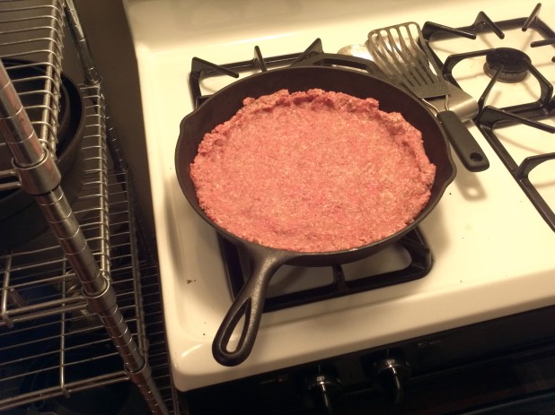 Meat in cast iron skillet
