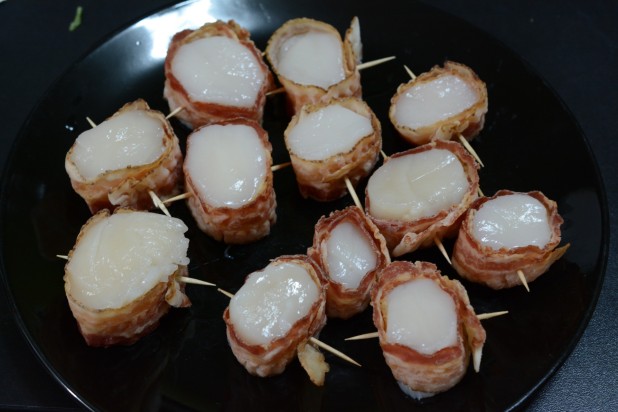 Scallops wrapped with Bacon ready for frying
